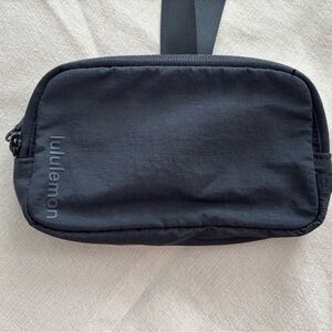 Mini black Lululemon belt bag